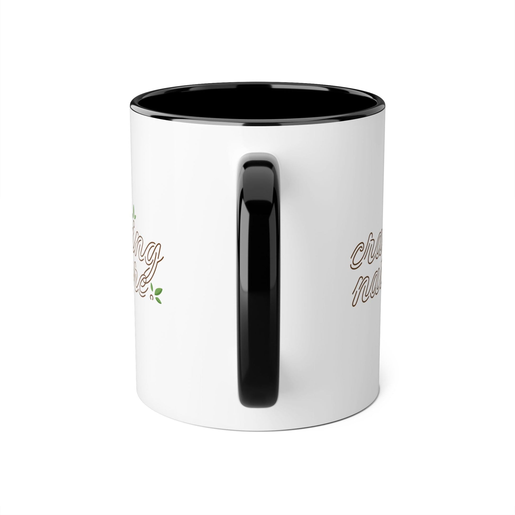 View with handle in front - Black (night) accent mug inside & on handle with white outside & craving nature design.