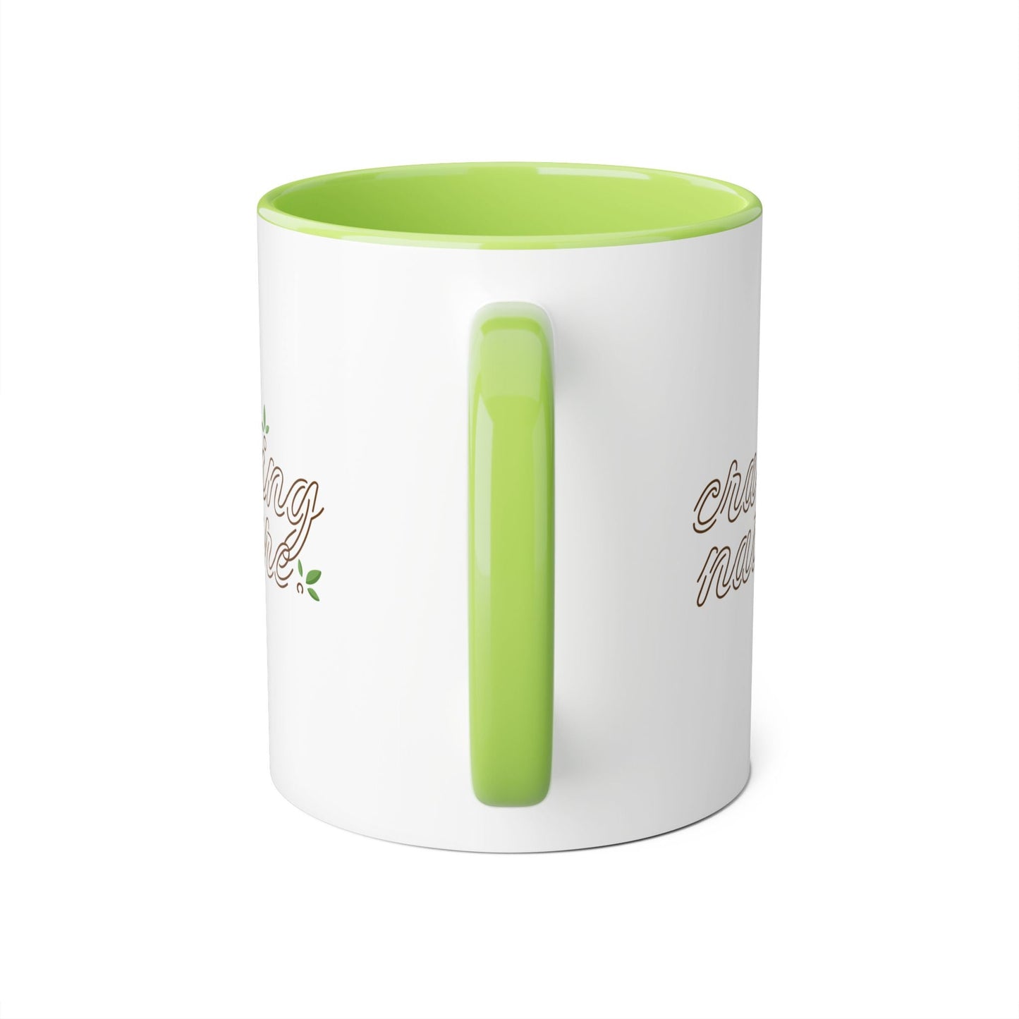 View with handle in front - Green (day) accent mug inside & on handle with white outside & craving nature design.