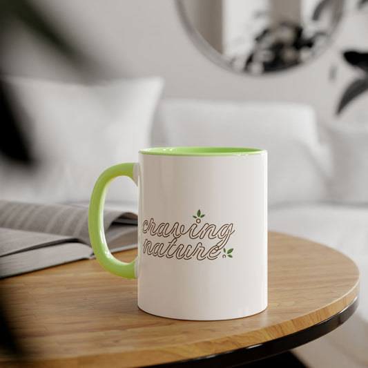 Green (day) accent mug inside & on handle with white outside, example on wood table in bright room.