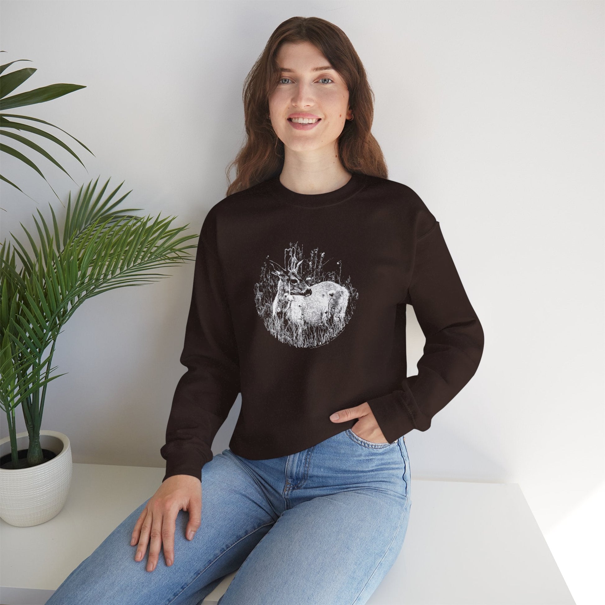 Model displaying fit on woman, 'Young Buck' sweater in 'dark chocolate' brown colour.